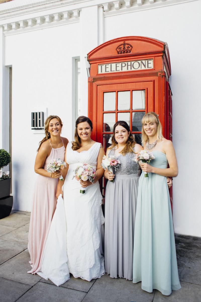 four bridesmaids stood outside