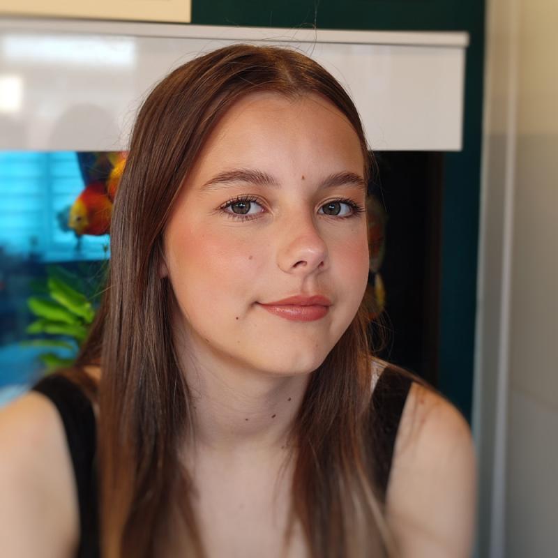 Natural bridesmaid makeup look with nude lips and soft eyeshadow