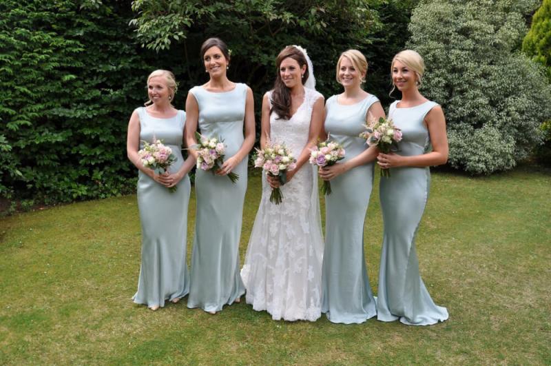 bridesmaids outdoor with bride with similar makeup applied