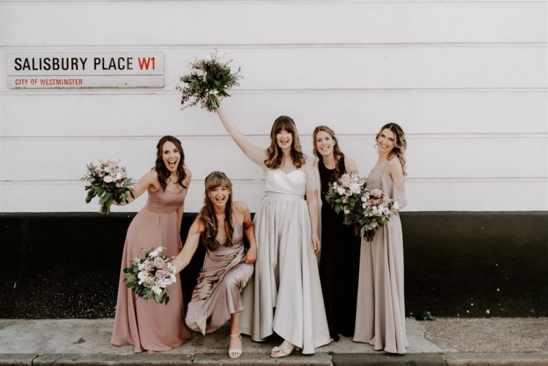 Bridal party with mix of natural and glam bridesmaid makeup