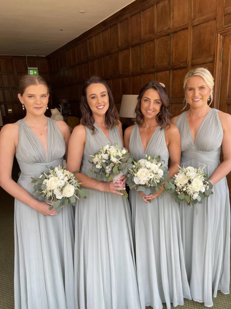 Bridesmaids together with matching dewy makeup looks