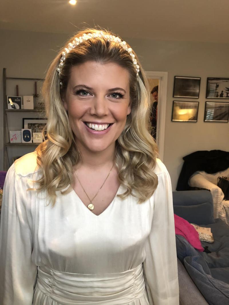 Bold bridesmaid makeup look for evening wedding reception