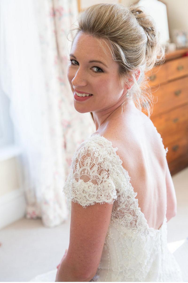 arabella-hewitt-make-up-artist-wedding-portfolio-1501137611.jpg blonde haired bride with makeup looking over shoulder