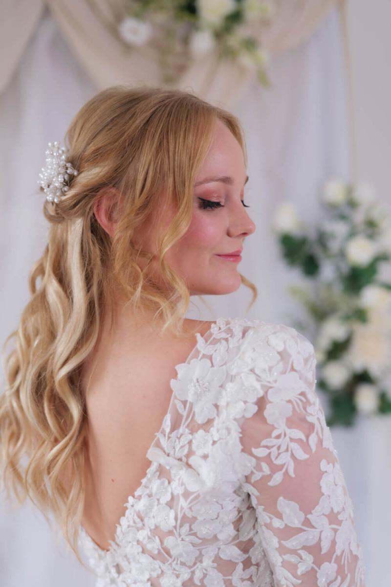 bride-by-becky-wedding-portfolio-1731339403.jpeg bride with half up half down wedding hair and long sleeved dress