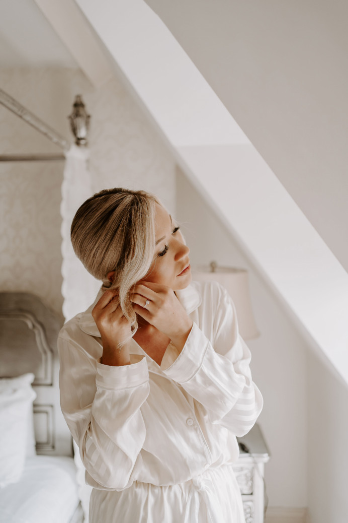 Face framing to add more dimension to your bridal hair - Make Me Bridal Artist: Glow-Occasion Hair Specialists. Photography by: Sharon Cudworth. #glamorous #blonde #glow #bridalhair #elegant #lowupdo