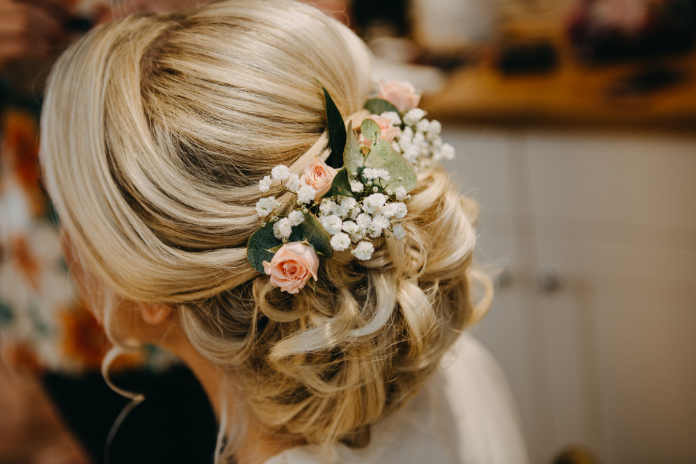 Summer bridal updo at South Farm, Royston - Make Me Bridal Artist: Cambridge Makeup Artist - Hair & Makeup. Photography by: Peter Oliver. #flowersinherhair #updo #rustic #bohohair