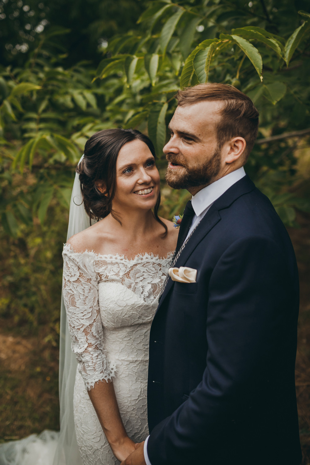 Beautiful bride and groom at Kingsettle Stud, with an intricate Bohemian-style bridal hairstyle. - Make Me Bridal Artist: Bridal Hair in Hampshire. Photography by: Mark Tattersall. #bohemian #classic #countryside