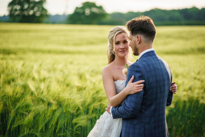 A beautiful summery countryside wedding. This gorgeous bride opted for a half-up, half-down bridal hairstyle for her golden locks. The result is absolutely stunning! - Make Me Bridal Artist: Bridal Hair in Hampshire. Photography by: Guy Collier. #classic #halfuphair #romantic #traditional