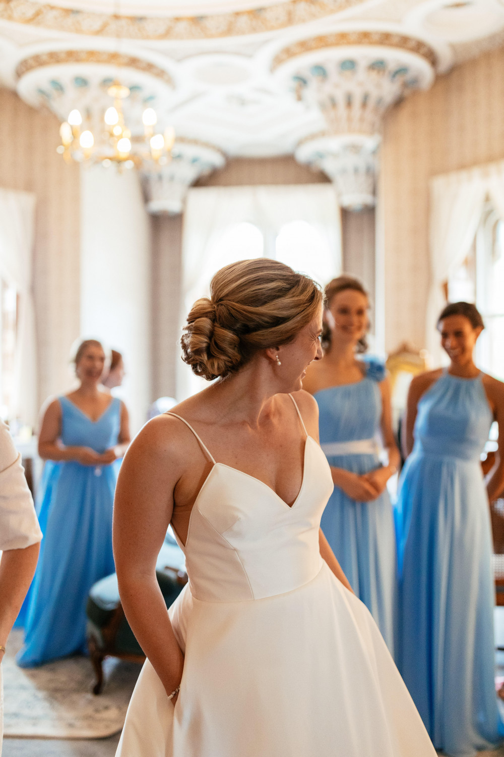 A beautiful bride at her Rhinefield House wedding, with a delicate traditional Chignon bun, perfect for incorporating her chosen veil! - Make Me Bridal Artist: Bridal Hair in Hampshire. Photography by: Suzy Wimbourne. #classic #vintage #romantic #chignon