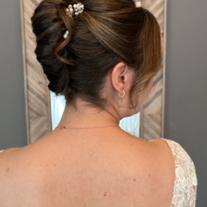 A modern elegant twisted updo a.k.a. the Pammy twist - #bridalhair #bridalmakeup #elegant #weddinghair #twistedupdo