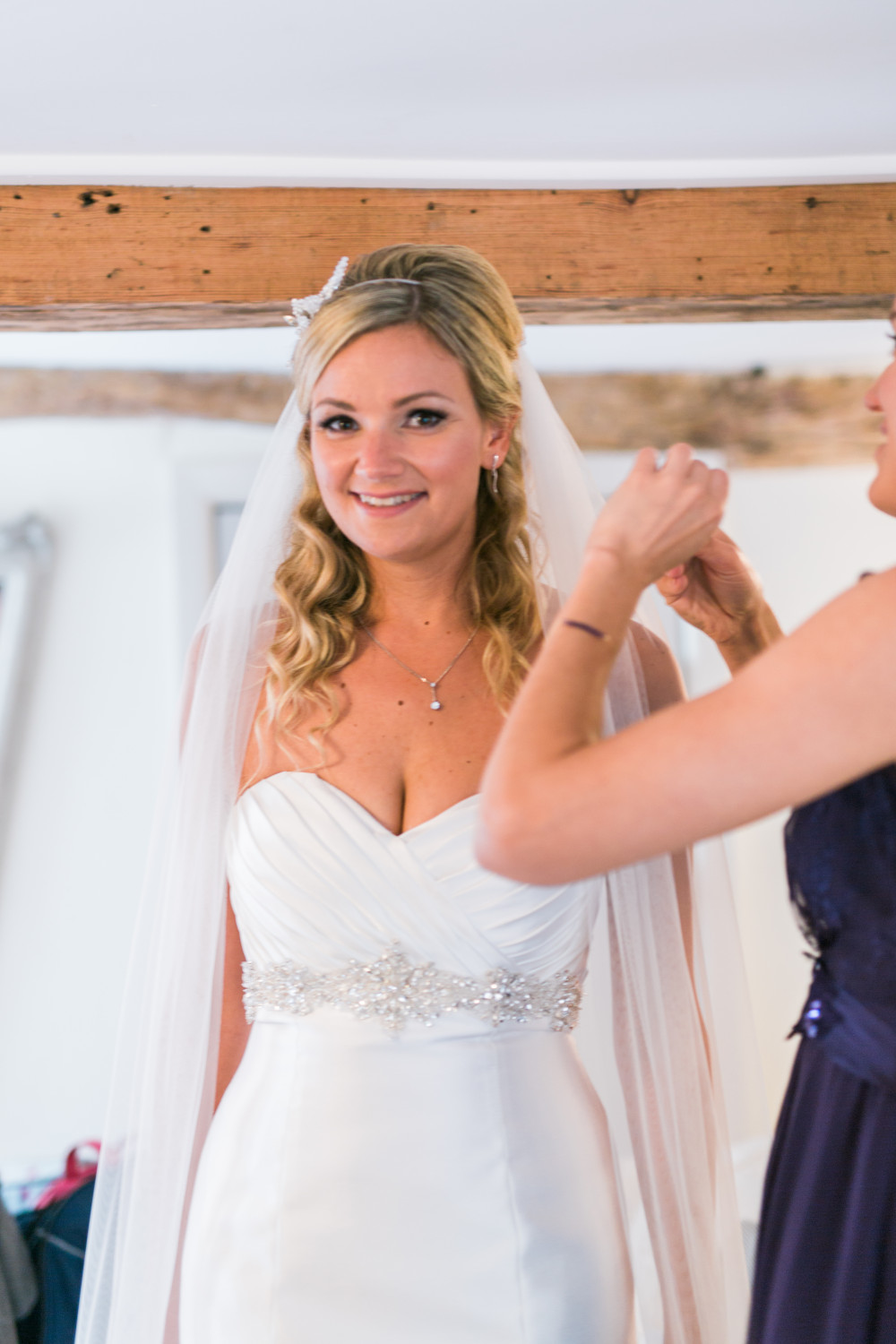 A classic look with a hint of glamour. - Make Me Bridal Artist: Lee O’D Makeup & Hair. Photography by: Sam Cook. #classic #halfuphair #bridalhair #airbrushedmakeup #bridalmakeup #glamourous #romantic #halfuphalfdown #softcurls #weddinghair #airbrush #weddingmakeup #airbrushmakeup