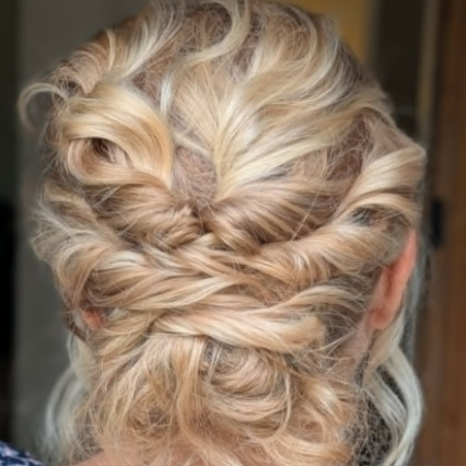 Boho bun for MOB - Photography by: Toni Searle. #bohemian