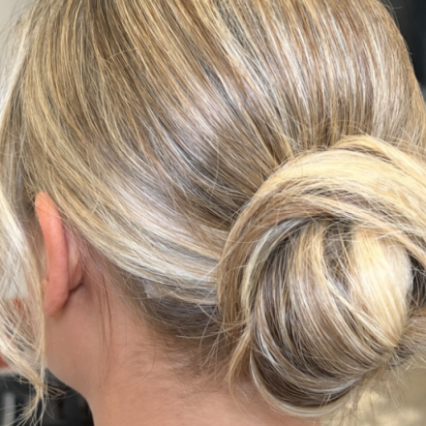Daisy had mid length hair just below her shoulders and with a few clever tricks we managed to add plenty of volume into her low bun. - #blonde #chignon #lowbun #weddinghair #bridalhair #modern #sleekhair