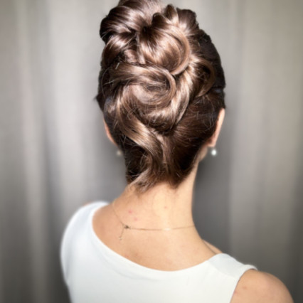 Gorgeous, sleek shiny updo on brunette hair. Modern french twist style. - Photography by: Myself. #updo #sleekhair #smoothupdo