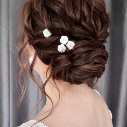 Romantic, curly textured low bun - Photography by: Charlotte Heather Bridal Hair. #curlyupdo #texturedbun #brunettehair