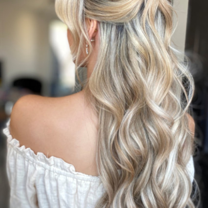 Soft textured waves with a french twist detail - Photography by: Charlotte Heather Bridal Hair. #halfuphair #texturedhair