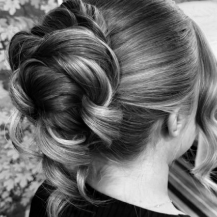  Photography by: By Rebecca Eve. #blonde #bridesmaidhair #bridalhairstylist #blackandwhite #texturedupdo #bridalbun