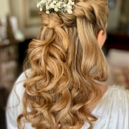 My bride wanted half up half Style. We used only her luscious natural hair . We created a braid like effect for detail and the gypsophila to make a lovely feminine classic bridal style. - #classic #halfuphair #blonde #gypsophila #bridalhair #curls