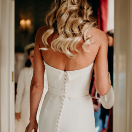My bride wanted a half up hairstyle that was loose yet chic. We did soft Hollywood waves and a loose twist. It worked perfectly with her strapless dress. - #bridalhair #glamourous #halfuphair #londonwedding #chic #loosewaves #londonmakeupartist