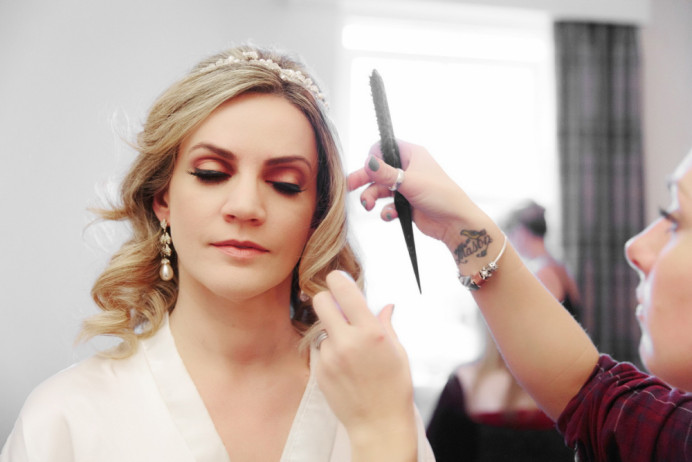 This Bride wanted Autumn colours and a coral lip with large false lashes. - Make Me Bridal Artist: Tania Claire Makeup Artist. Photography by: Steve & Tania Photography. #glamorous #smokeyeyes #bridalmakeup #weddingmakeup #winterwedding #winterweddingmakeup #falselashes #surreymakeupartist #airbrushmakeup
