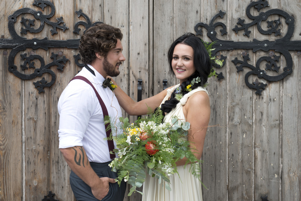 This fishtail plait is a great modern natural style. My gent has natural curly hair blow-dried to give a softer style to suit his rugged image  - Make Me Bridal Artist: Kreative Hairdressing . Photography by: Amanda Dantuma. #boho #flowersinherhair #natural