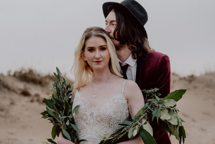 Gorgeous boho bride shot on the beach by Louise Griffin. - Make Me Bridal Artist: Glamorama Makeup. Photography by: Louise Griffin Photography. #bohemian #boho