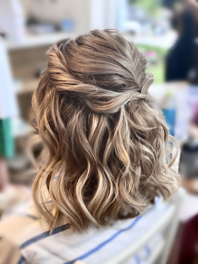 Textured beach waves for this lovely bridesmaid. Twisted detail to keep it modern and interesting - Make Me Bridal Artist: Carter Hair & Makeup. Photography by: Me. #boho #halfuphair #bridesmaidhair #bohobride #bohowedding #beachwaves #softcurls #twisteddowndo #halfuphalfdown