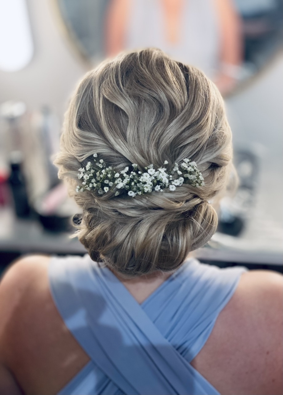 Softly defined boho updo for a lovely bridesmaid - Make Me Bridal Artist: Carter Hair & Makeup. Photography by: Me. #bohemian #bridalhair #flowersinherhair #updo #bridesmaidhair