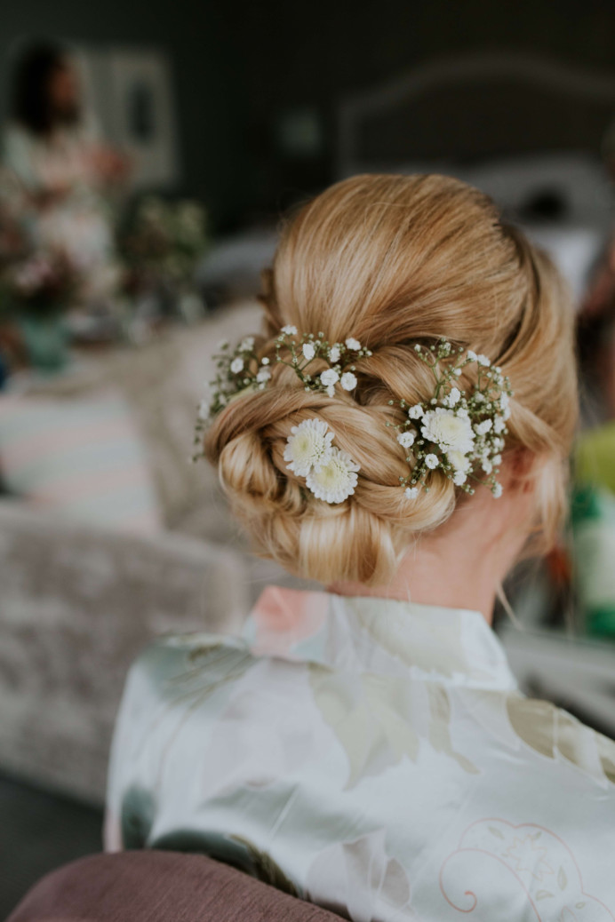 I had the honour of doing both the hair and make up for this bride at the Grand Hotel in Brighton. I simply adore the brides choice of large daisy flowers to incorporate into this stunning style that is both relaxed and elegant at the same time! So pretty and timeless... - Make Me Bridal Artist: Jenna West Make Up. Photography by: Hayley Savage. #bridalhair #flowersinherhair #blondebride #blondeupdo