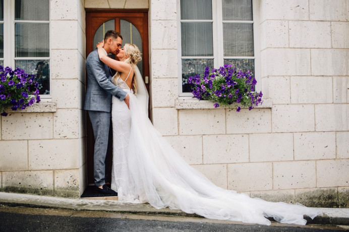 Leah with her new husband in Chรขteau Mas de Montet - Make Me Bridal Artist: Butterfly Hair & Makeup. Photography by: Roostain Photo.