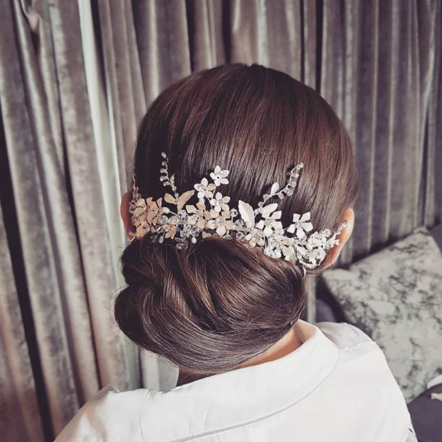Charlotte's wedding at Hilton London Syon Park - Make Me Bridal Artist: Butterfly Hair & Makeup. Photography by: Butterfly Artist. #glamorous #hairup #hairvine #chic #clean