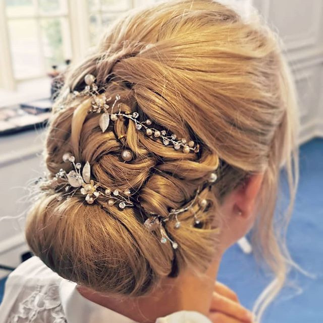 Lucy's wedding at Horsley Towers - Make Me Bridal Artist: Butterfly Hair & Makeup. Photography by: Butterfly Artist. #blonde #hairup #hairvine #surreywedding #pearl