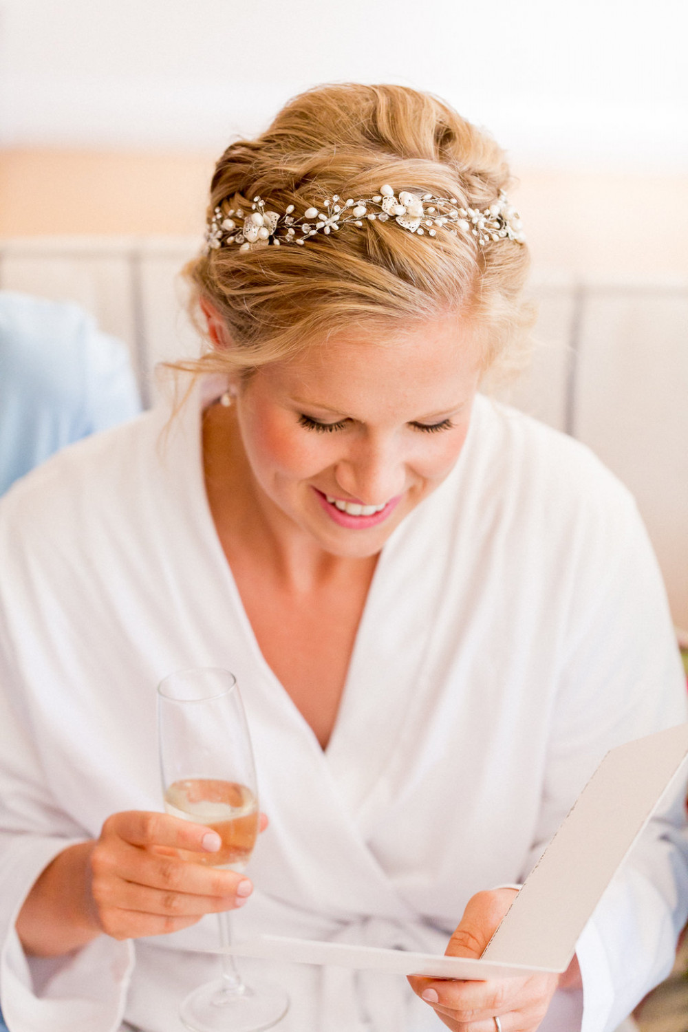 Happy bride with natural hair and classic, soft plaited up do. - Make Me Bridal Artist: Amanda Roberts Hair & Makeup. Photography by: Philippa Sian. #classic #naturalmakeup #bridalmakeup #bridalhair #braidedupdo #plaits #hairaccessories #hairup